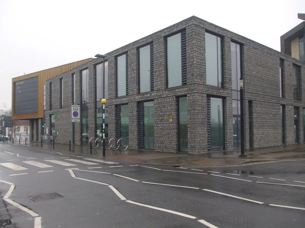Exterior of Keynsham Library beside the street and pedestrian crossing