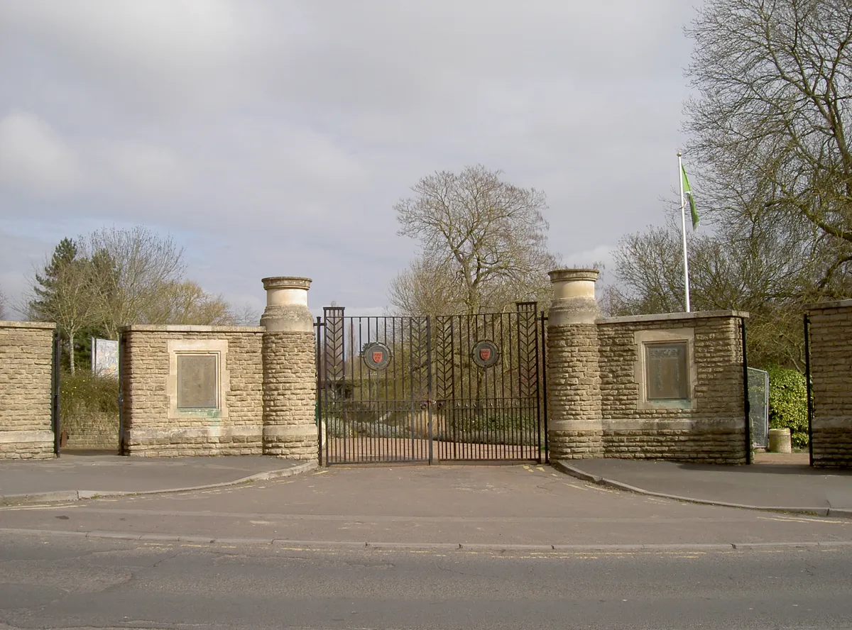 Stone pillars and iron entrance gates at Keynsham Memorial Park